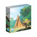 Termite Towers board game box featuring a large sandy-colored termite mound surrounded by lush green jungle foliage. The artistic cover art shows a tropical forest setting with a wooden sign displaying the game title, while bright blue publisher logos appear in the bottom corners. 