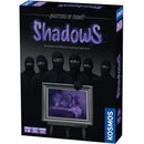Masters of Crime: Shadows board game box featuring six silhouetted figures in black masks against a dark background with purple lighting effects. The box displays a framed classical painting in the center and includes the Kosmos publisher logo, with purple and black color scheme throughout the packaging design.
