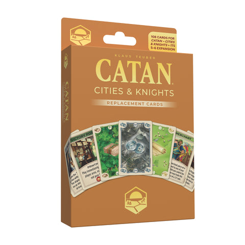 Box of Catan Cities & Knights Replacement Cards featuring a copper-orange package with gold lettering. The box displays five sample cards including Victory Point, forest, silver coins, parchment, and Merchant cards spread in a fan pattern.