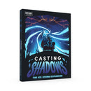 Casting Shadows: The Ice Storm Expansion board game box featuring dramatic artwork of a hooded figure wielding ice magic against a swirling blue storm with a menacing dragon silhouette above. The box displays the Unstable Games publisher logo and shows the dark fantasy aesthetic with predominant blue and purple color scheme. 