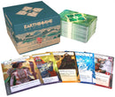 Earthborne Rangers Stewards of the Valley expansion box with a teal and mountain-themed design, displayed alongside stacks of green-backed cards and five sample character cards spread out in front. The box features the Earthborne Rangers logo and "Stewards of the Valley" subtitle with artistic mountain landscapes. 