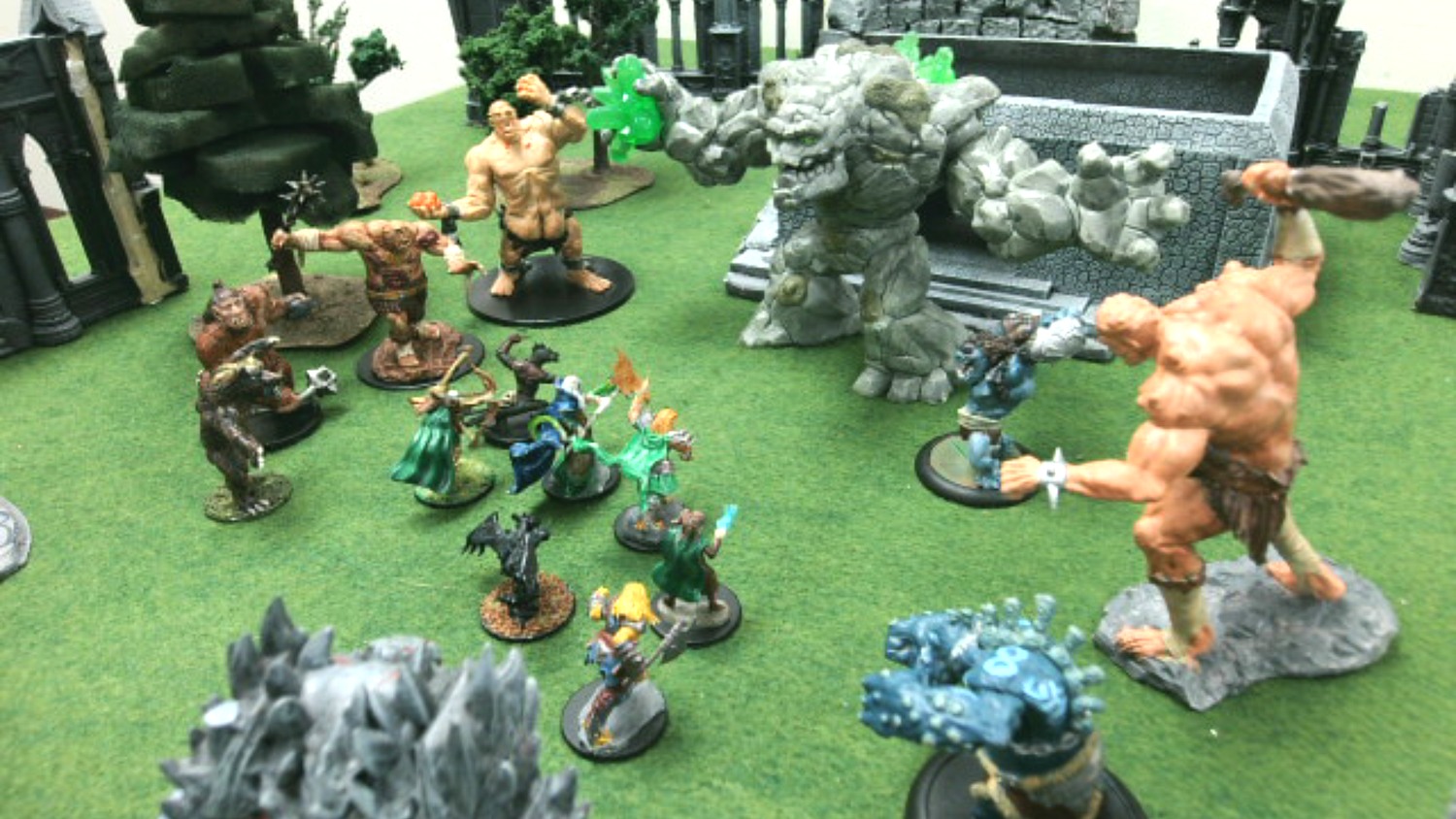 Miniature monster figures about to fight
