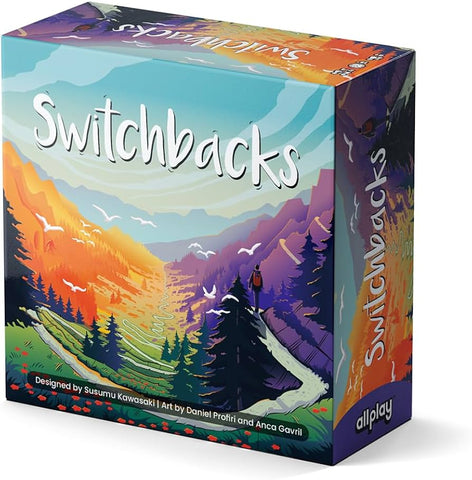 Box art for "Switchbacks" featuring a vibrant mountain landscape with winding paths. The colorful illustration shows purple and orange mountains with pine trees, a small hiker figure on a trail, and flying birds against a blue sky.