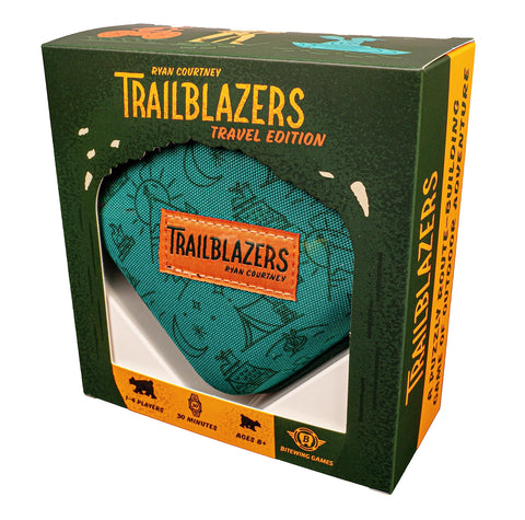 The box for "Trailblazers Travel Edition" by Ryan Courtney, showing a green packaging with yellow text and outdoor-themed graphics. Inside the window display is a teal zippered carrying pouch with an orange patch bearing the game logo.