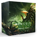 Nemesis Lockdown Acrylic Pack board game accessory box featuring dark sci-fi artwork with alien creatures and organic growths in green atmospheric lighting. The cube-shaped package displays the game's title in white lettering against a haunting scene of twisted alien forms and mechanical structures.