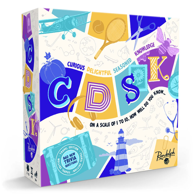 CDSK Travel Edition board game box featuring colorful geometric design with large letters C, D, S, K in blue, yellow, teal, and purple sections. The box displays "CURIOUS DELIGHTFUL SEASONED KNOWLEDGE" across a banner and includes travel-themed illustrations like an airplane, lighthouse, and tennis racket scattered throughout.