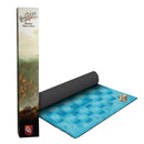Pirates of Maracaibo official playmat shown with its tall cardboard packaging box and partially unrolled blue ocean-themed gaming mat. The packaging features pirate ship artwork with underwater scenes in muted greens and browns, while the playmat displays a grid pattern of blue ocean squares with small ship icons. 
