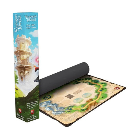 Wandering Towers board game playmat showing the colorful fantasy-themed game mat partially unrolled from its storage tube, with the blue retail box featuring tower artwork visible alongside.