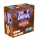 Drop Drive Deluxe Upgrade board game box featuring vibrant space-themed artwork with swirling galaxy colors in orange, purple, and blue tones. The box displays the game title prominently in white letters with a cosmic design, along with "Deluxe Upgrade" and "Phase Shift Games" branding. The packaging showcases a starfield background with geometric crystal-like elements, emphasizing the space exploration theme of this board game enhancement set.
