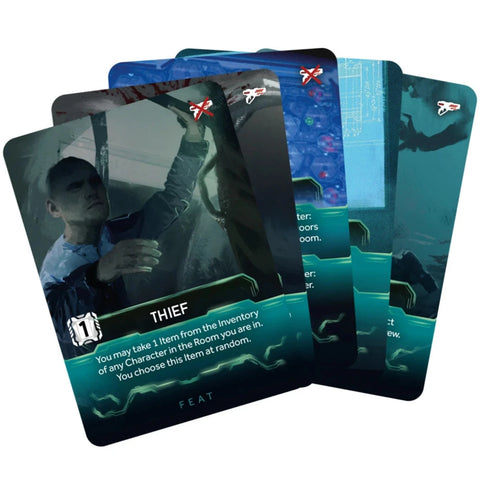 e promo game cards from the board game Nemesis are fanned out, showing dark sci-fi themed artwork featuring characters in spacesuits and alien environments.
