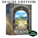 The Gilded Realms Deluxe Edition board game box featuring a stone archway framing a scenic medieval fantasy landscape with mountains, a winding cobblestone path, and distant castles. The ornate box design displays the game title in golden lettering against a rich blue and stone-textured background.