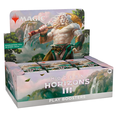 Modern Horizons 3 Play Booster Display Box featuring a white-maned lion humanoid with a golden axe on a lush fantasy landscape backdrop. The box contains 36 individually packaged booster packs arranged in rows, with GUARANTEED FOIL IN EVERY PACK! prominently displayed on a green banner. 