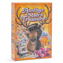 Box cover of 'Another Man's Treasure' board game by Grandpa Beck's Games, featuring a cartoon moose wearing glasses and a peace sign necklace surrounded by vintage items. The colorful orange box displays a retro aesthetic with decorative antlers, an instant camera, Christmas tree, disco ball, and beads.