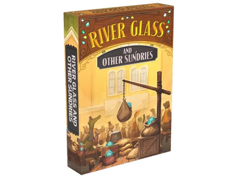The rectangular box features a warm yellow and brown color scheme with decorative turquoise gems, depicting a marketplace scene with various sacks and containers of glass materials being weighed on a scale. Box art for "River Glass: And Other Sundries," a board game expansion for River Valley Glassworks.