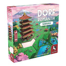 Dorfromantik Sakura board game box featuring a colorful Japanese landscape with a traditional multi-tiered pagoda as the centerpiece. The artwork shows cherry blossoms, rolling green hills, blue water features, and Mount Fuji in the background under a pink sky.