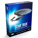 Star Trek Star Realms deck-building game box featuring the USS Enterprise starship against a blue starfield background. The box displays the Star Trek logo prominently with 'Star Realms' branding and indicates it's a deck-building game published by Wise Wizard Games.