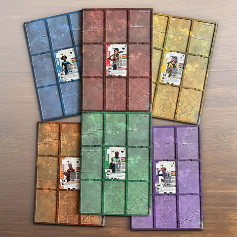 Set of colorful card holders with cards inside on a wooden surface