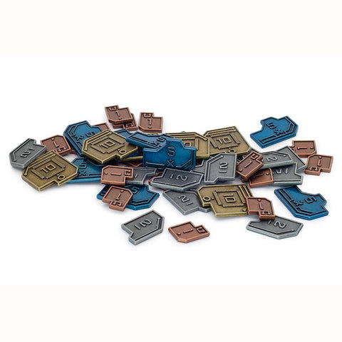 Set of metallic game pieces on a white background