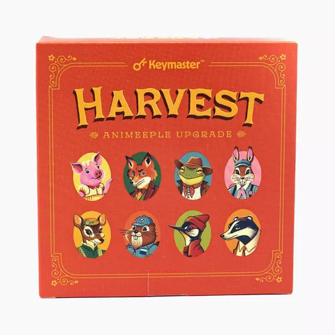 Harvest Animeeple Upgrade board game expansion box featuring colorful anthropomorphic animal character portraits arranged in two rows on a red background. The box shows eight different animal characters including a pig, fox, turtle, rabbit, deer, beaver, bird, and badger, each illustrated in a distinctive cartoon style with various accessories and clothing. The Keymaster Games logo appears at the top with decorative golden border elements framing the character artwork.